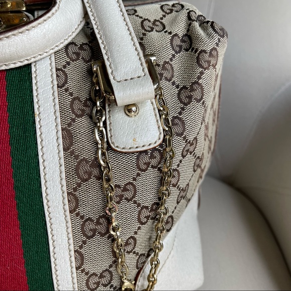 40% PRICE DROP!!
$4777 (was $795)
GUCCI Treasure Boston w/Key And Charm - Picture 8 of 16